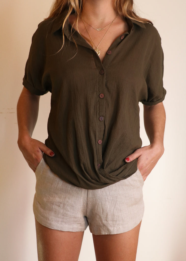 100% organic cotton shirt, certified sustainable clothing. Eco friendly apparel in our organic cotton button up blouse and 100% linen shorts with pockets.