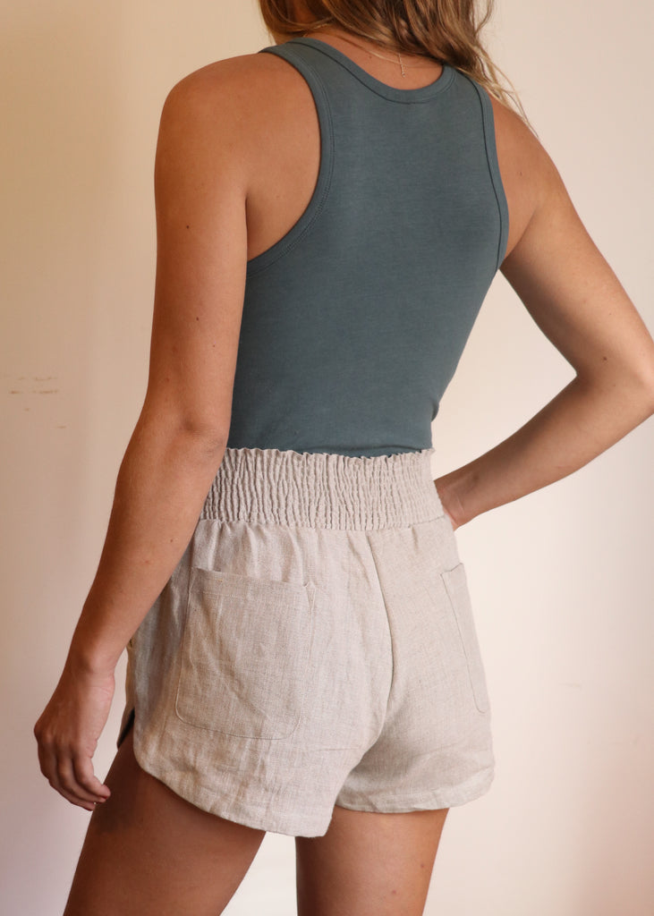 100% Linen certified sustainable clothing. Eco friendly apparel in our organic linen shorts and organic cotton tank.