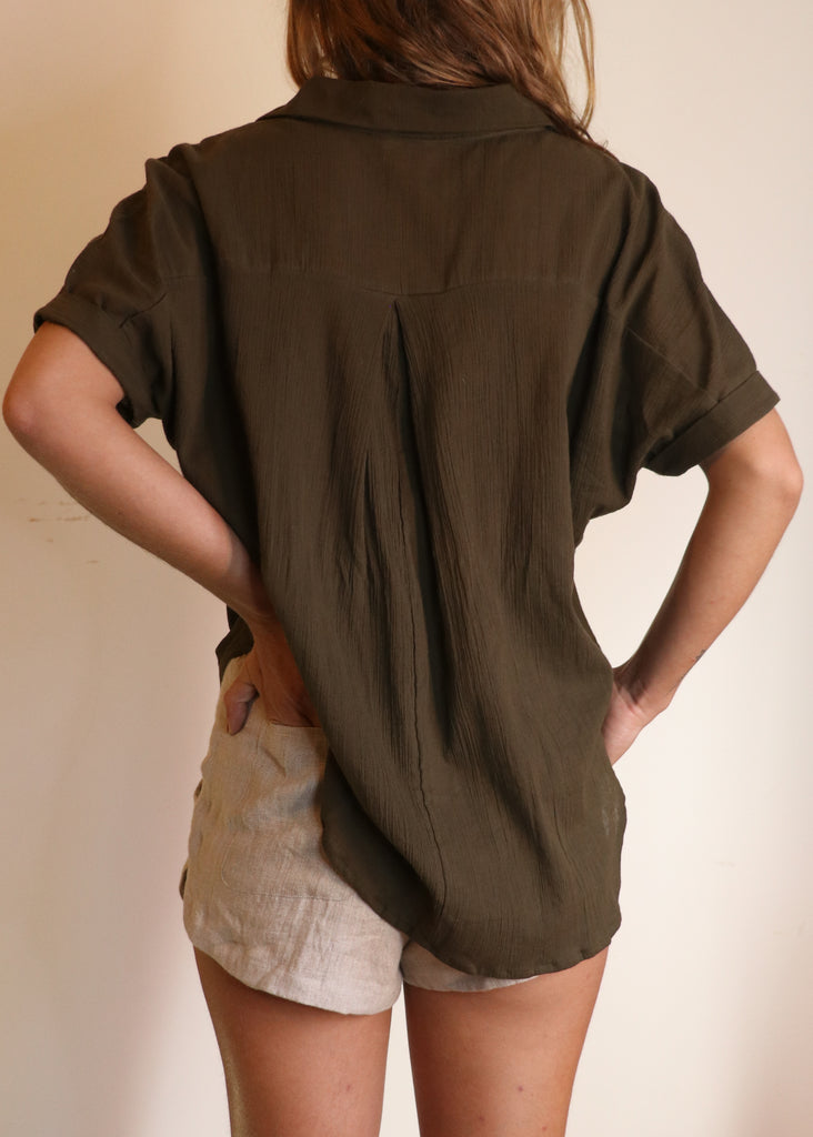 100% organic cotton shirt, certified sustainable clothing. Eco friendly apparel in our organic cotton button up blouse and 100% linen shorts with pockets.